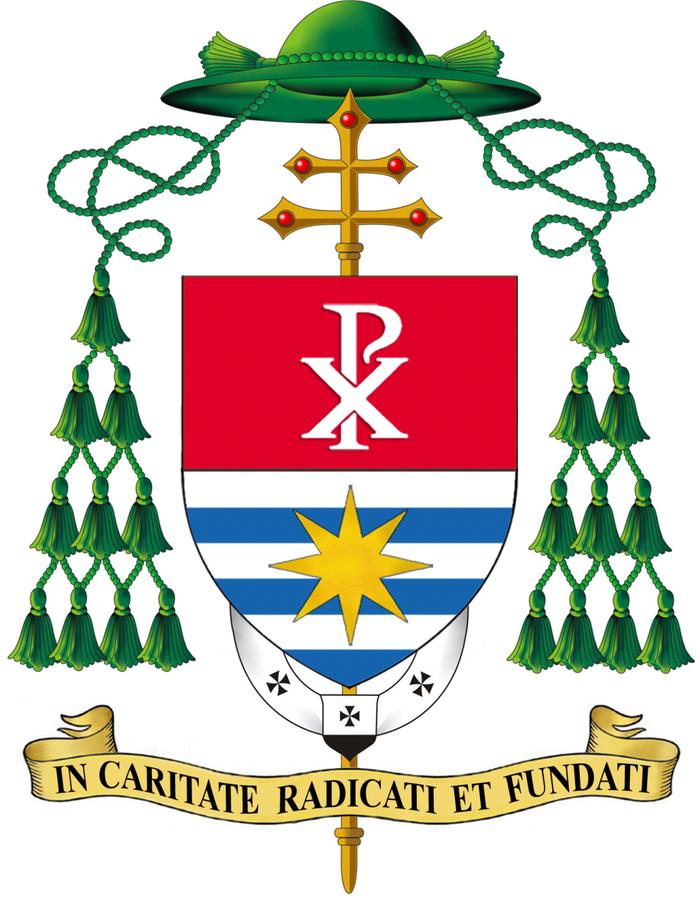 Blazonul Arhiepiscopului — In caritate radicati et fundati